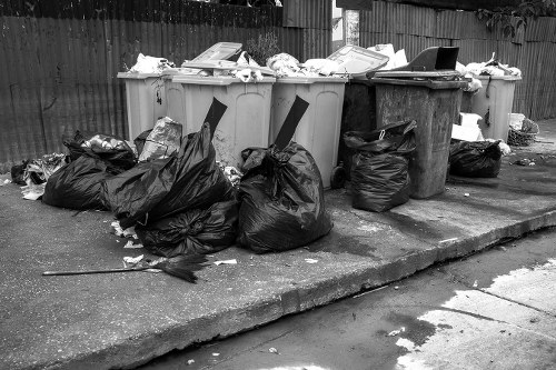Residents disposing of household waste in Newham